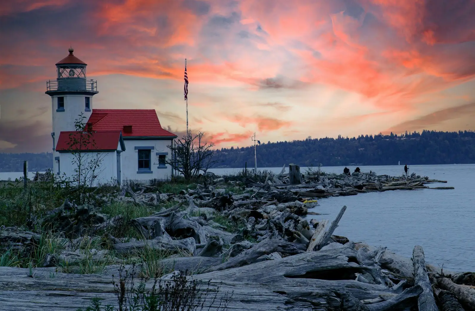 The red-and-white Point Robinson Lighthouse on the beach at Maury Island, Vashon, Washington.